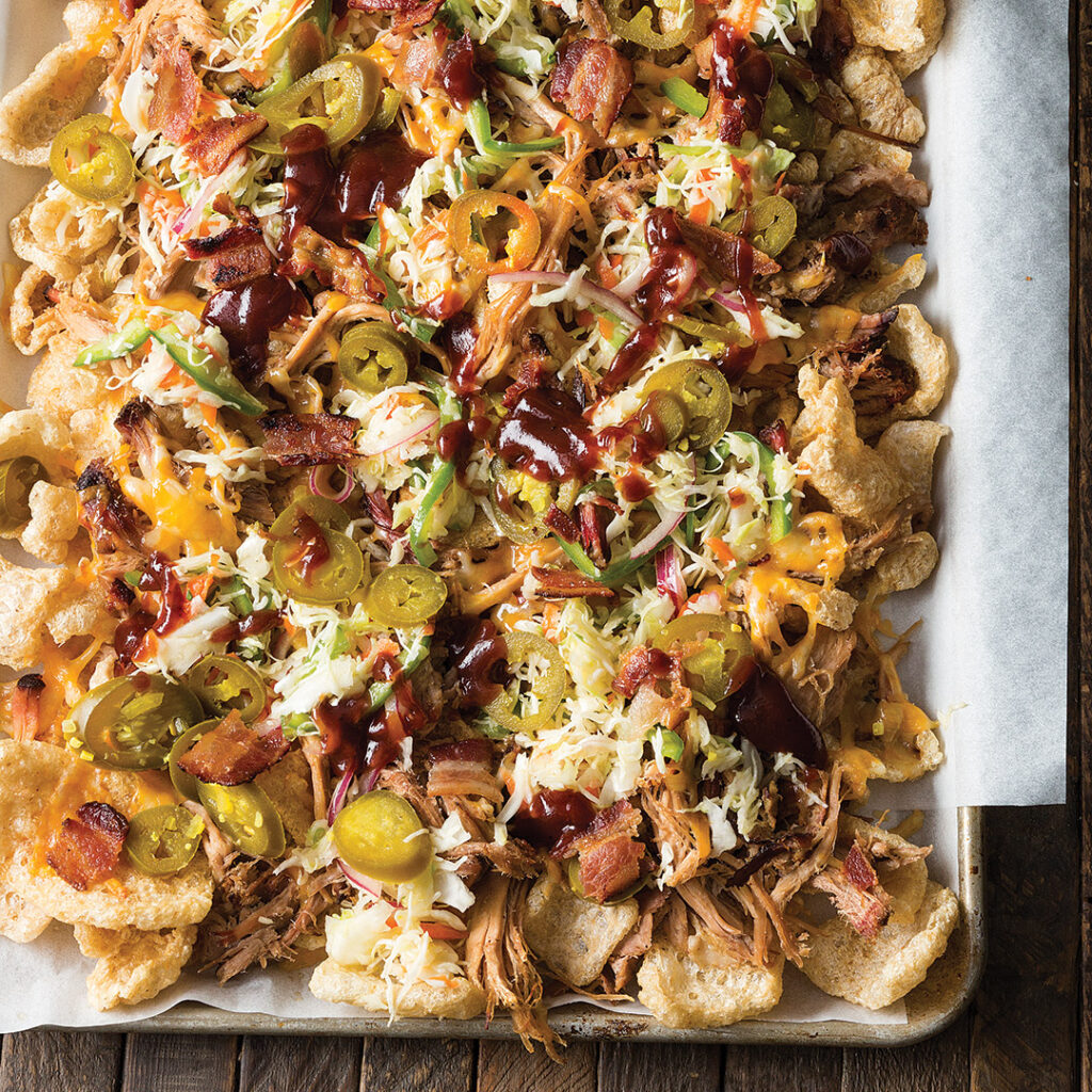 Pork Rind Nachos are your favorite pork rind topped with your favorite fixings.