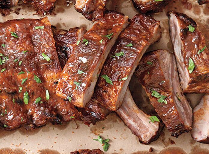 Perfect Potluck Ideas for Veteran's Day weekend: Orange-Chipotle glazed ribs.