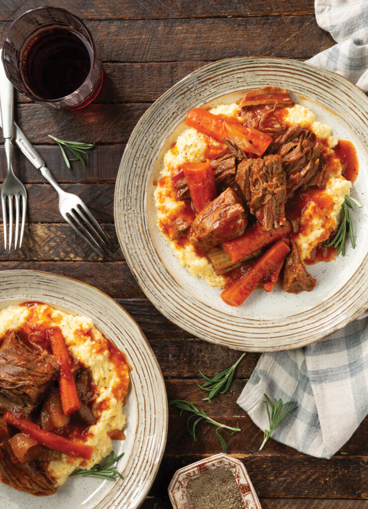Your family will come running for a taste of this rich Sunday Pot Roast with Creamy Cheddar Cheese Grits.