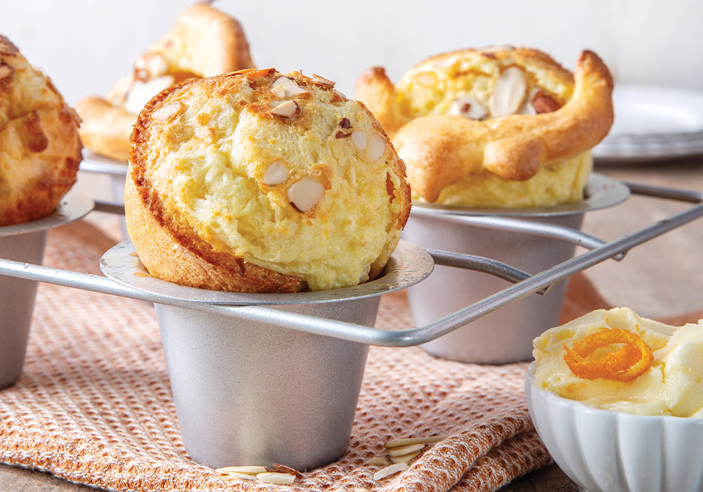 Crunchy almonds and sweet citrus make these tasty Orange Almond Popovers perfect for the season, especially served with our bright and zesty Orange Butter.