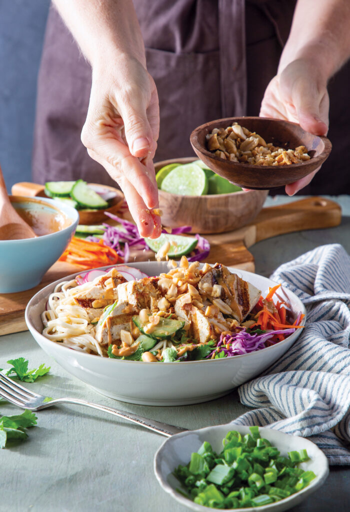Savor the vibrant flavors of our Noodle Crunch Bowl with Peanut Sauce, a delightful fusion of wholesome ingredients and bold Asian-inspired tastes. Featuring tender noodles, crisp vegetables, and a variety of crunchy toppings, each bite offers a burst of texture and freshness. Drizzled with a delicious miso dressing and sweet peanut sauce, this vegetarian noodle bowl delivers a harmonious blend of savory and nutty notes, sure to tantalize your taste buds.&nbsp;