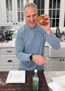 Portrait of Darryl Postelnick in his kitchen.