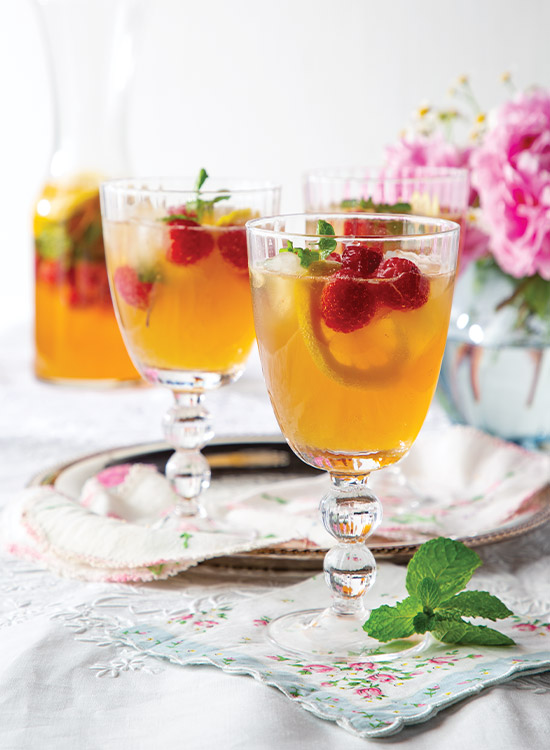 Sweet botanicals, bright citrus, and fresh raspberries dapple delicately in a pitch of Elderflower Punch.