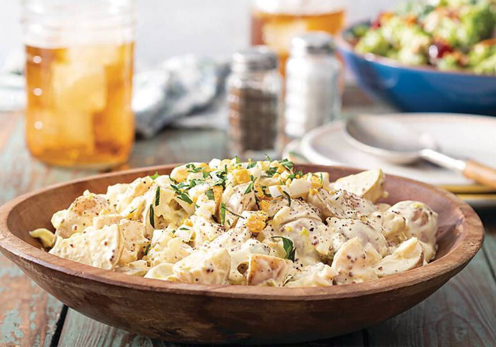 Sometimes, you just can't beat a good old-fashioned Creamy Potato Salad. Yukon golds are the star here, mixed with the mustard, dill, and mayo gold standard.