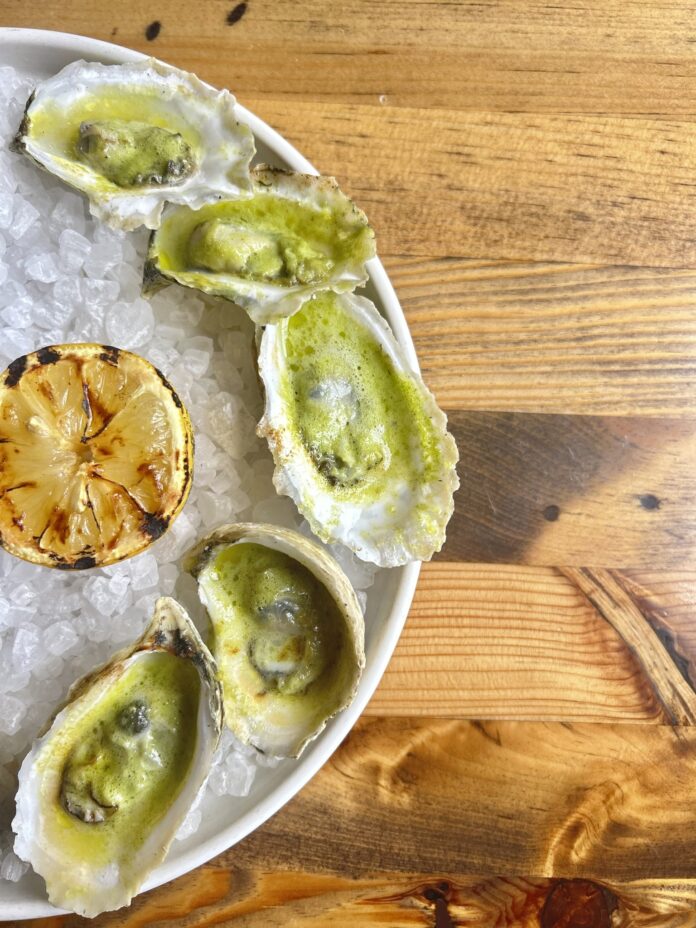 Top Chef alum Chef Jamie Lynch’s Charcoal Roasted Oysters are a fresh spin on backyard grilling sure to turn heads and delight taste buds this season.