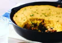 Potlikker Pot Pie pot pie with cornbread crust and greens