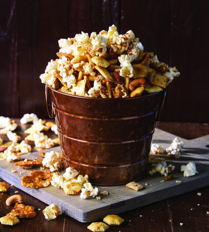 popcorn snack mix with pretzels, cheese squares, and more